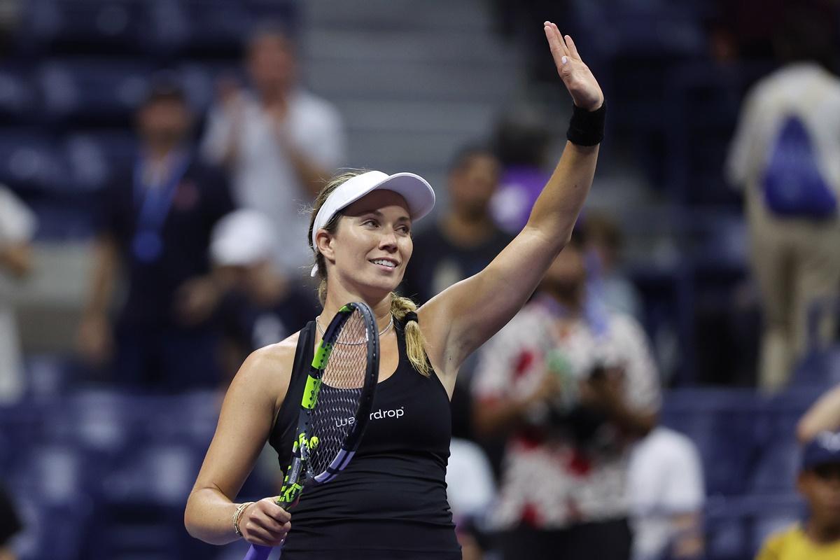 Danielle Collins of the United States celebrates after defeating Japan's Naomi Osaka.