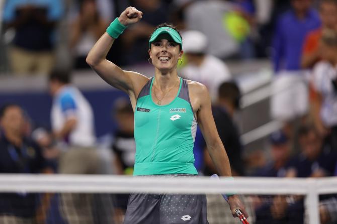 France's Alize Cornet celebrates defeating Emma Raducanu of the United States in the first round at 2022 US Open on Tuesday.