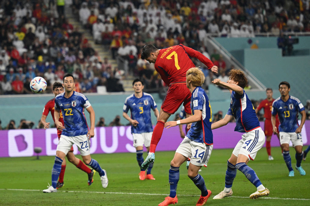Spain's Alvaro Morata heads to score his side's first goal