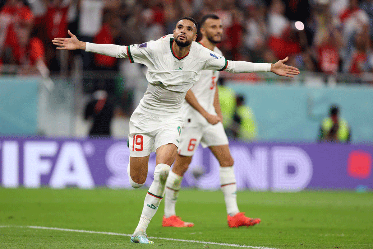 Morocco's Youssef En-Nesyri celebrates after scoring the third goal later ruled offside.