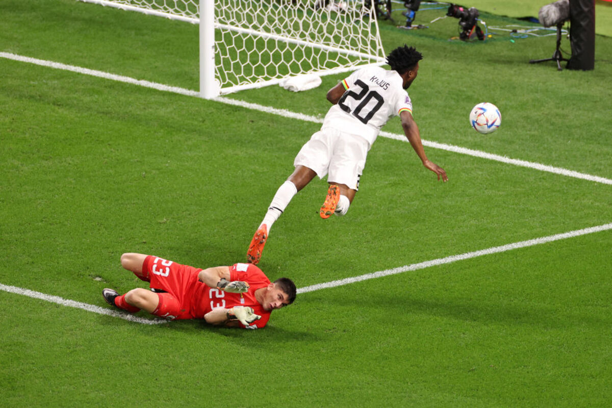 Mohammed Kudus of Ghana is brought down by Sergio Rochet of Uruguay in the box