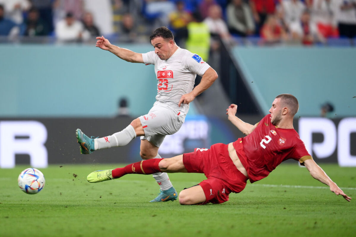 Granit Xhaka of Switzerland is attacked by Nikola Milenkovic of News  Photo - Getty Images