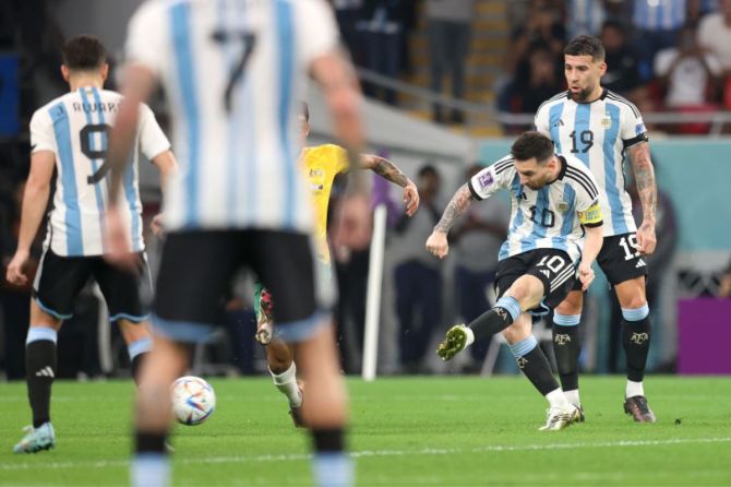 Lionel Messi scores the team's first goal during the FIFA World Cup Qatar 2022 Round of 16 match between Argentina and Australia