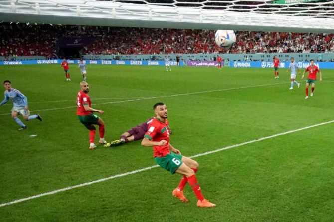  Morocco's Yassine Bounou saves a shot from Spain's Gavi onto the bar during the FIFA World Cup Qatar 2022 Round of 16 match between Morocco and Spain