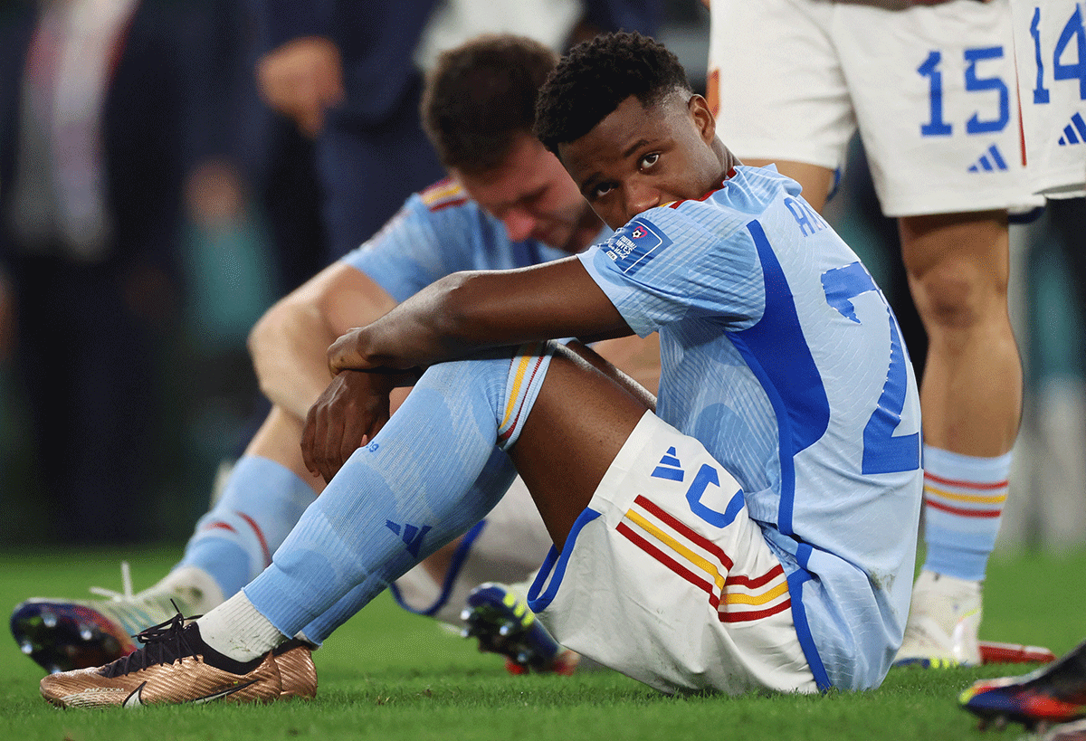 Spain's Ansu Fati looks dejected after the penalty shootout as Spain are eliminated from the World Cup 