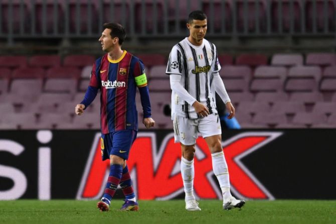 Lionel Messi of Barcelona (L) and Cristiano Ronaldo of Juventus F.C