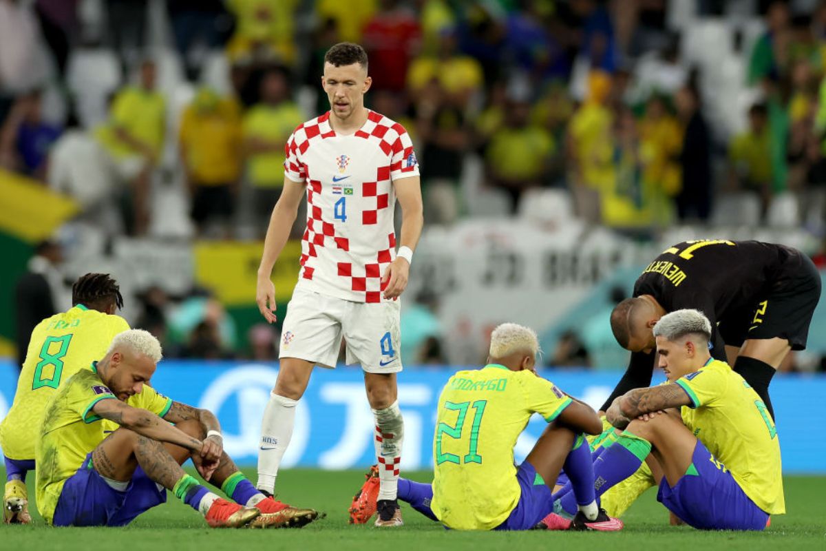 Brazil's Neymar and his teammates look dejected after losing the FIFA World Cup Qatar 2022 quarter-final match to Croatia