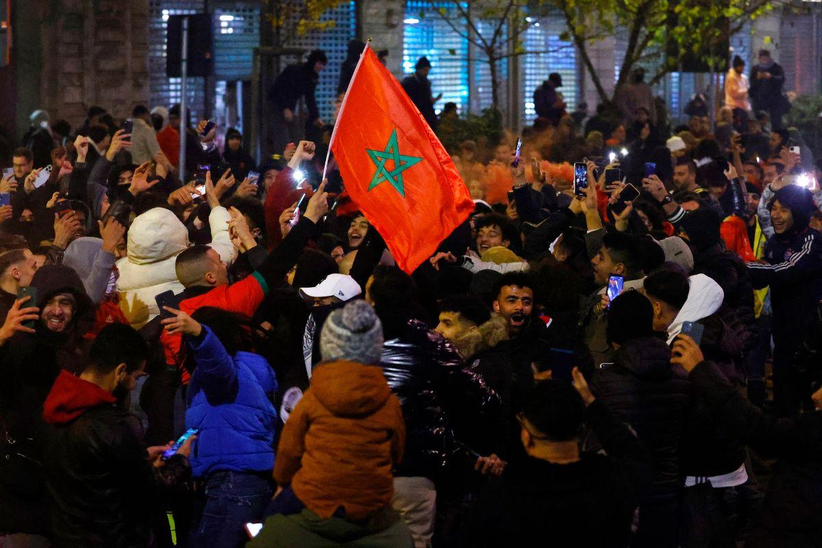 Morocco fans celebrate after the match as Morocco progress to the semi finals