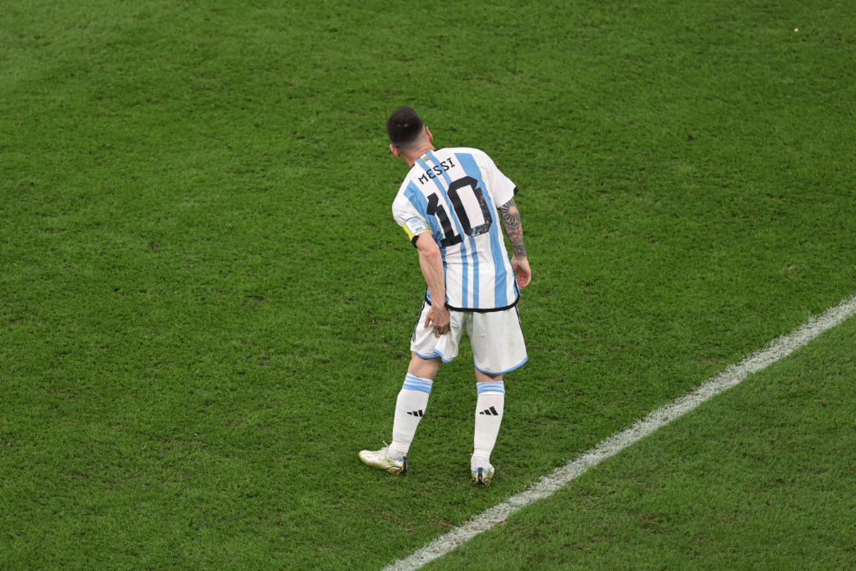 Lionel Messi catches his hamstring
