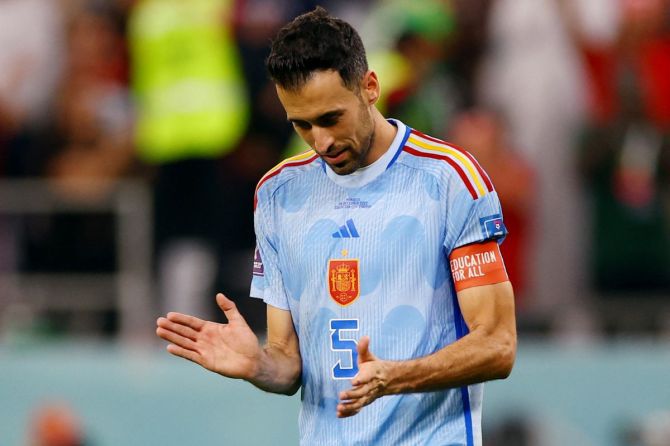 Spain's Sergio Busquets looks dejected after his penalty is saved by Morocco's Yassine Bounou during the penalty shootout 