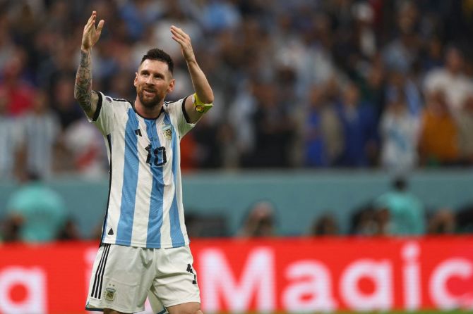 Argentina's Lionel Messi celebrates after Julian Alvarez scores their third goal