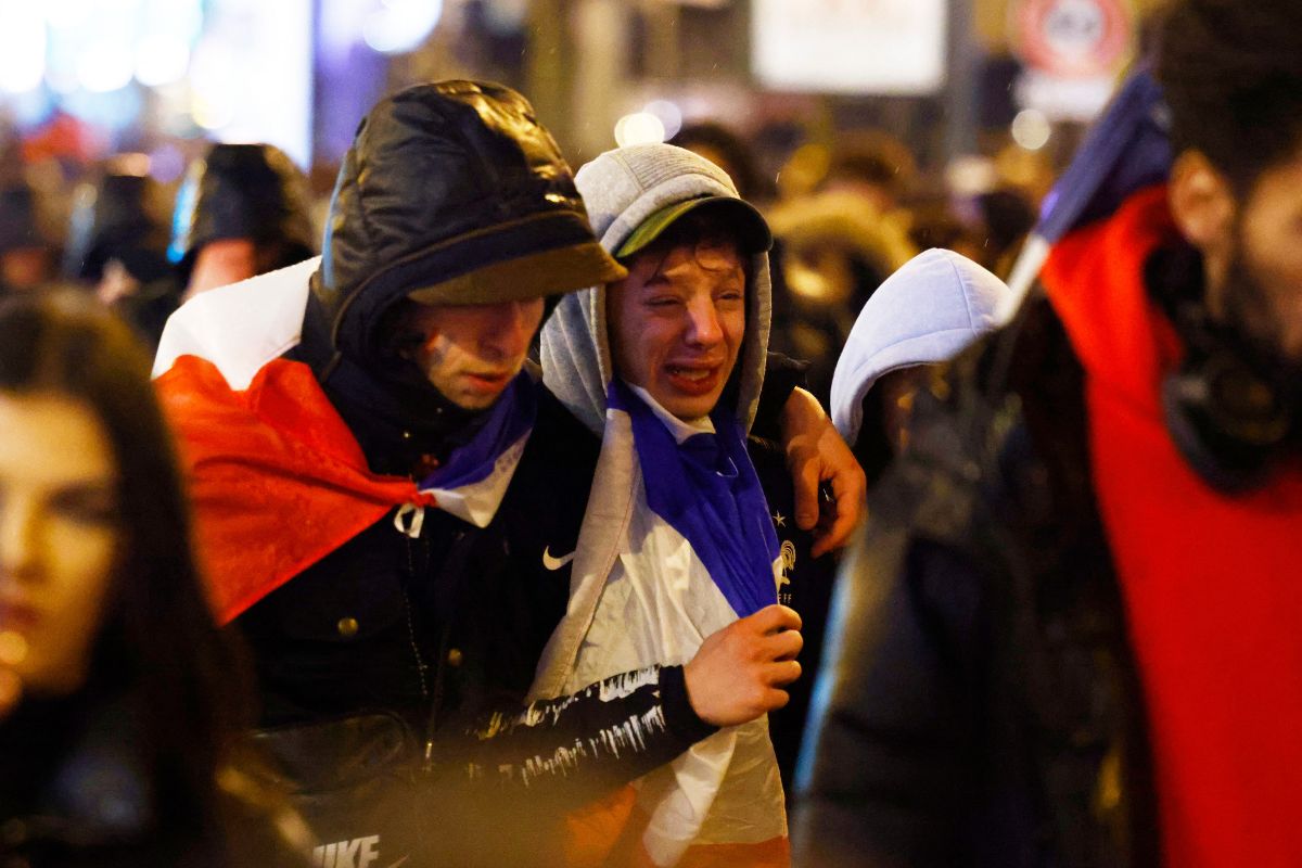 France fans look dejected after the final