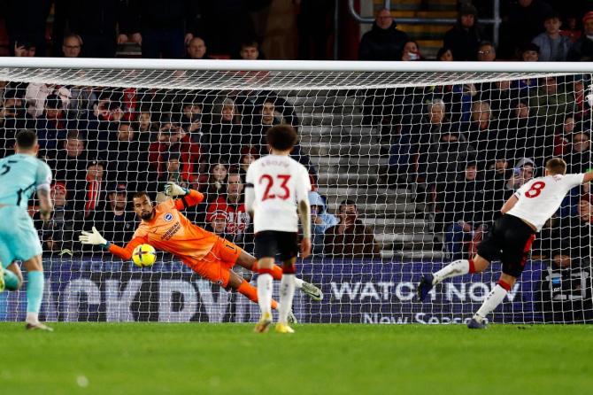 Southampton's James Ward-Prowse has his penalty saved by Brighton & Hove Albion's Robert Sanchez