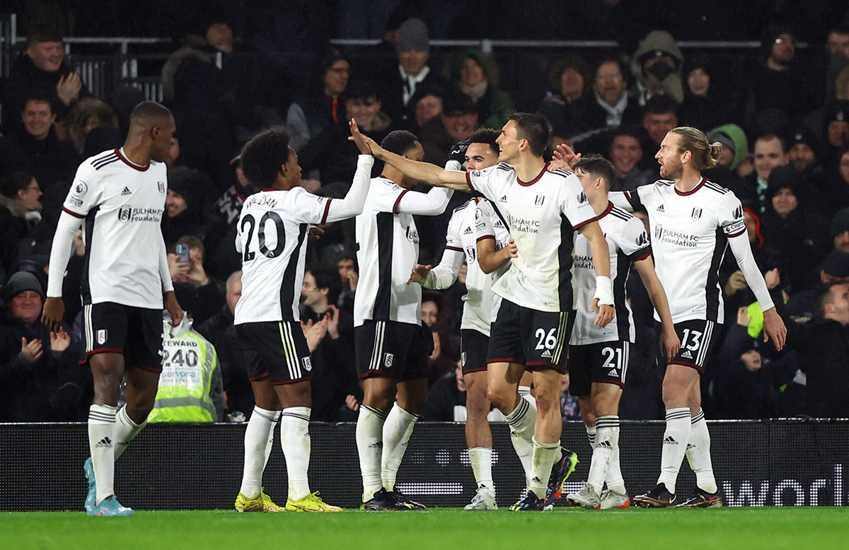 Fulham's Joao Palhinha celebrates with teammates after scoring their second goal against Southampton at Craven Cottage