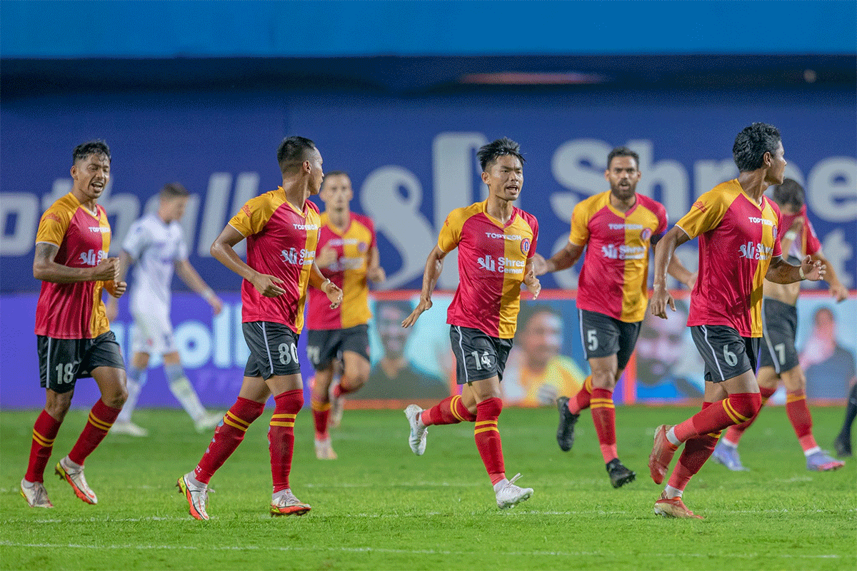 SC East Bengal players celebrate after Lalrinliana Hnamte scored the injury time equaliser to hold Chennaiyin FC during their Indian Super League match on Wednesday