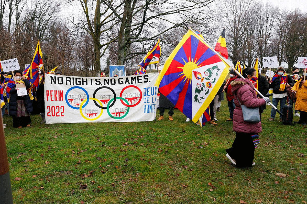 Members of the Tibetan communities living in Europe gather to protest in front of the headquarters of the International Olympic Committee (IOC) in Lausanne, Switzerland, on Thursday