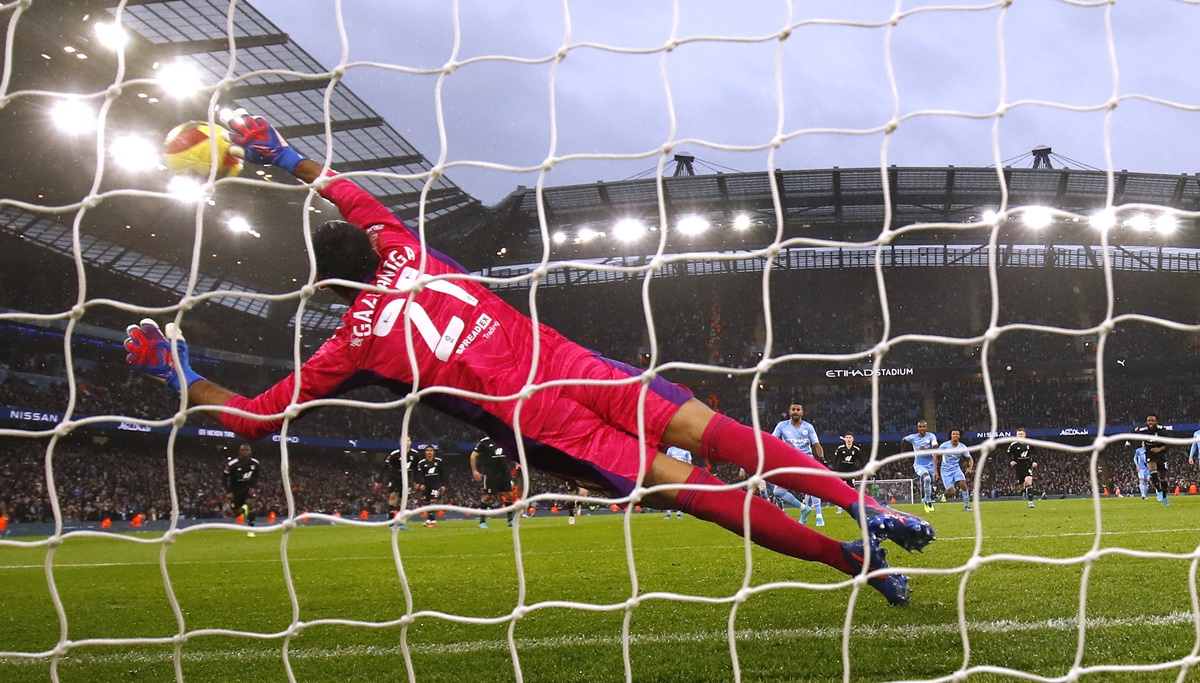 Riyad Mahrez scores Manchester City's third goal from the penalty spot in the FA Cup match against Fulham, at Etihad Stadium, in Manchester.