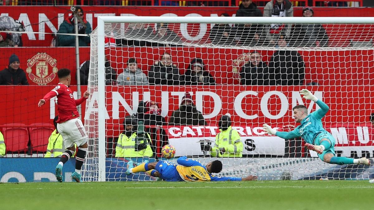 Jadon Sancho scores to put Manchester United ahead in the Premier League match against Southampton, at Old Trafford, Manchester, on Saturday.