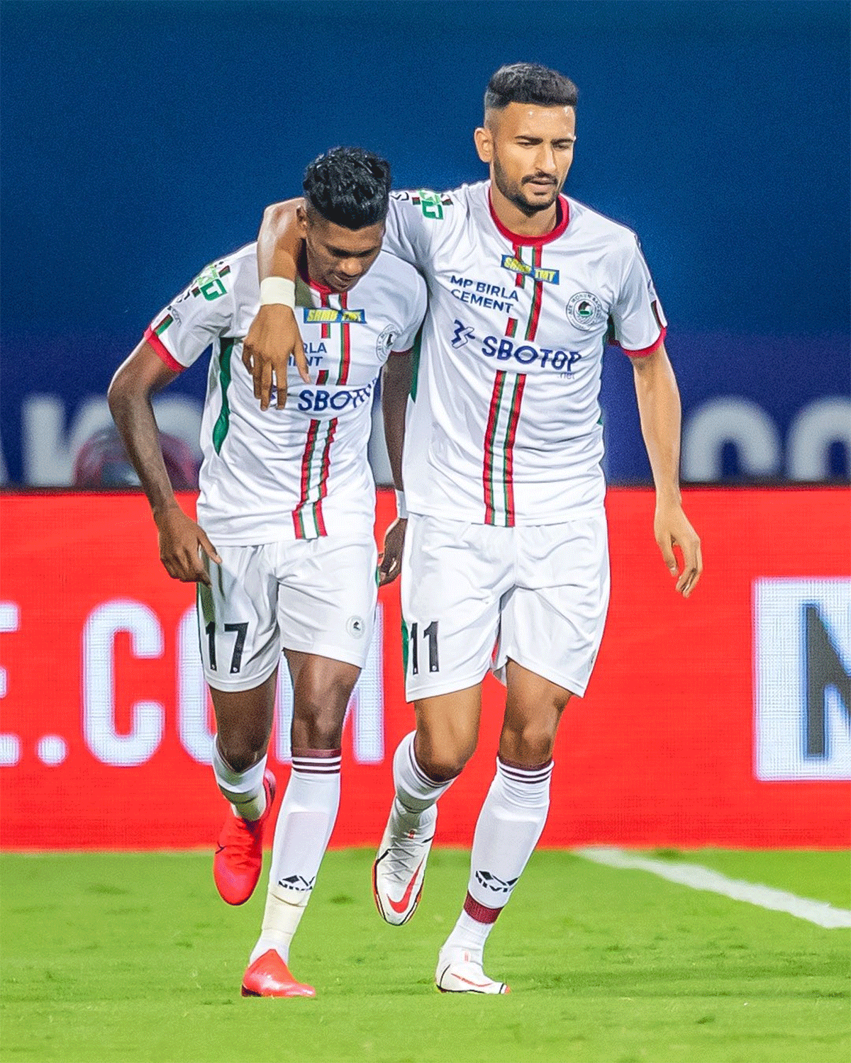 ATK Mohun Bagan's Manvir Singh (right) celebrates on scoring the opening goal against FC Goa on Tuesday