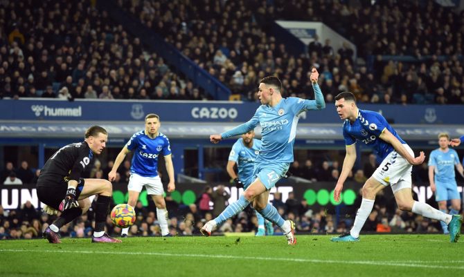 Phil Foden scores what turned out to be the match-winner for Manchester City in the Premier League match against Everton, at Goodison Park, Liverpool, on Saturday.