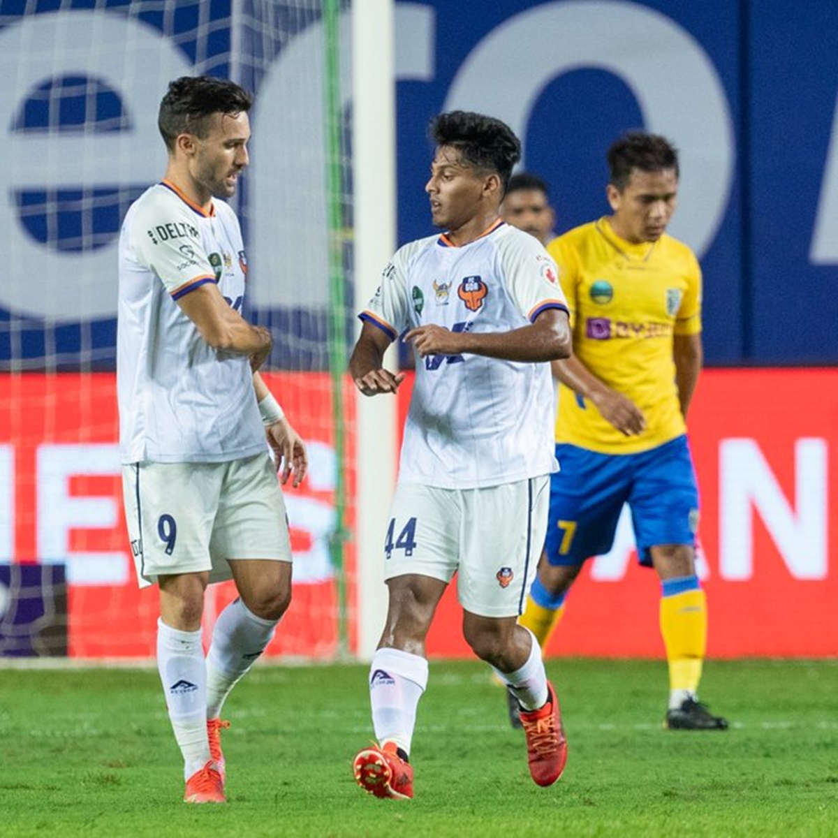 Jorge Ortiz celebrates with Mohammed Nemil after pulling a goal back for FC Goa in the ISL match against Kerala Blaster in Vasco, Goa, on Sunday.