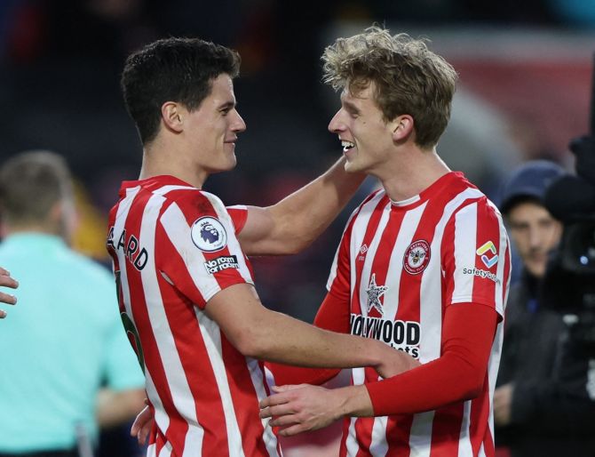 Brentford's Mads Roerslev celebrates with Christian Norgaard after clinching victory over Aston Villa, in the Premier League match at Brentford Community Stadium, London, on Sunday.