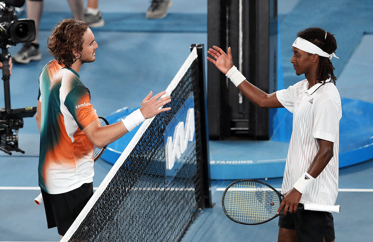 Greece's Stefanos Tsitsipas is congratulated by Sweden's Mikael Ymer after their first round match