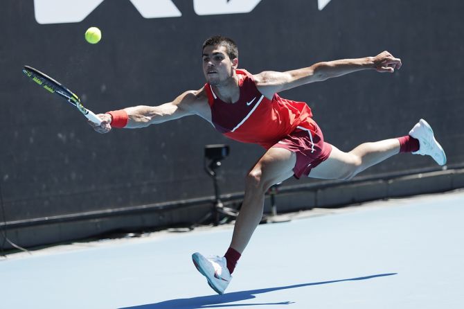 Spain's Carlos Alcaraz plays a forehand during his second round  match against Serbia's Dusan Lajovic.