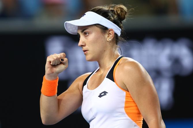 Montenegro Danka Kovinic celebrates winning a point during her second round match against Great Britain's Emma Raducanu.