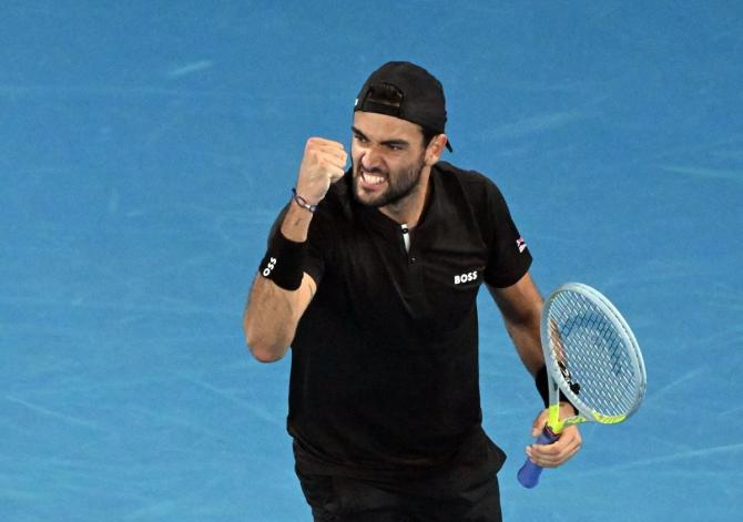 Italy's Matteo Berrettini reacts after winning a point during his quarter-final against France's Gael Monfils.