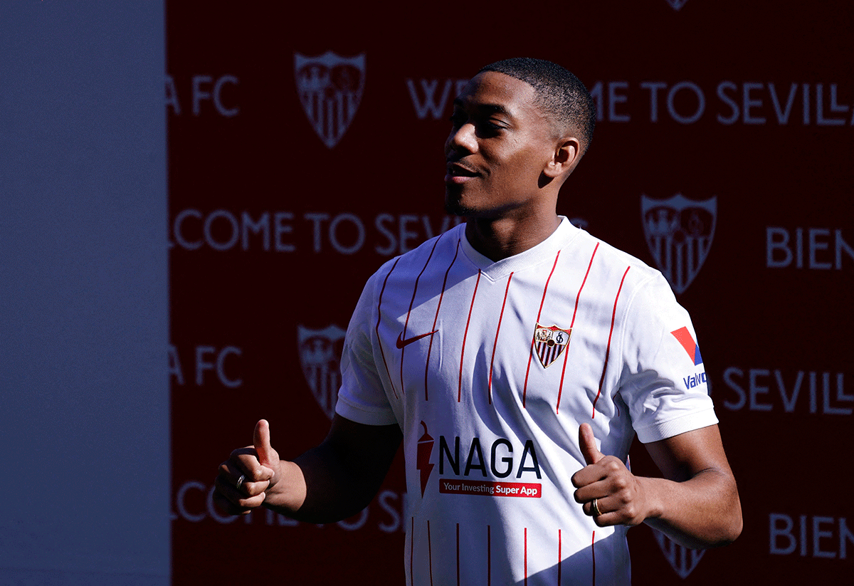 Anthony Martial poses during his presentation after signing for Sevilla on loan at the Ramon Sanchez Pizjuan, Seville on Wednesday