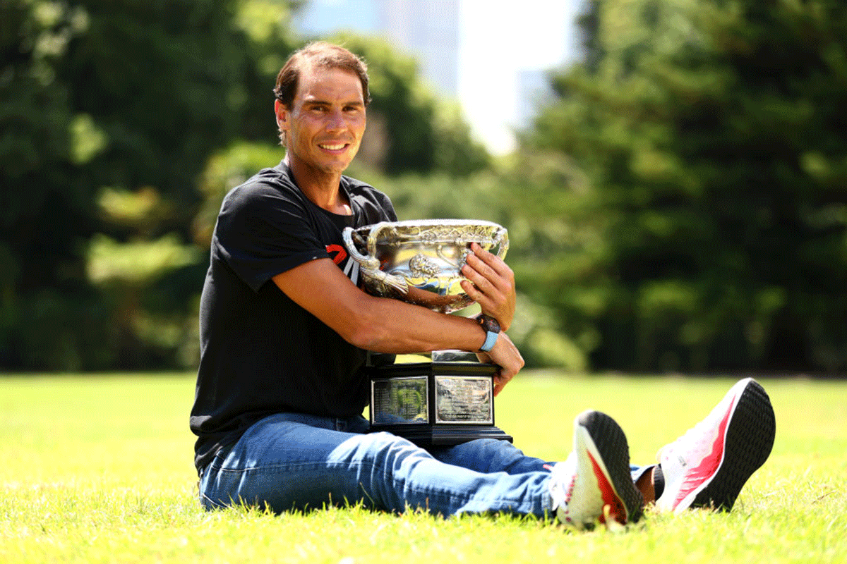 Rafael Nadal poses with the Norman Brookes Challenge Cup