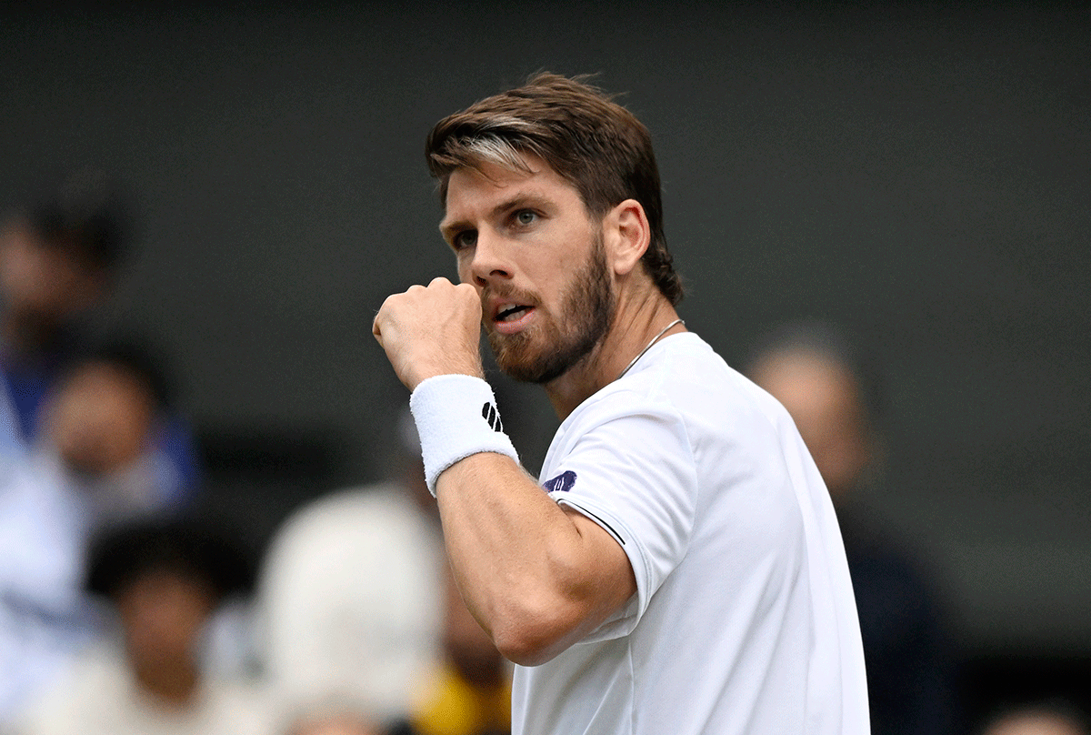 Britain's Cameron Norrie celebrates after winning his third round match against USA's Steve Johnson