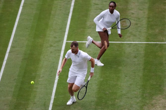 Britain's Jamie Murray and Venus Williams of the United States during their Wimbledon first round mixed doubles match against Australia's Michael Venus and Poland's Alicja Rosolska, at the All England Lawn Tennis and Croquet Club, London, on Friday.