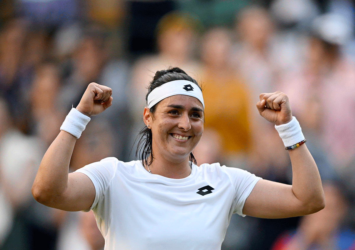 Tunisia's Ons Jabeur celebrates winning her fourth round match against Belgium's Elise Mertens