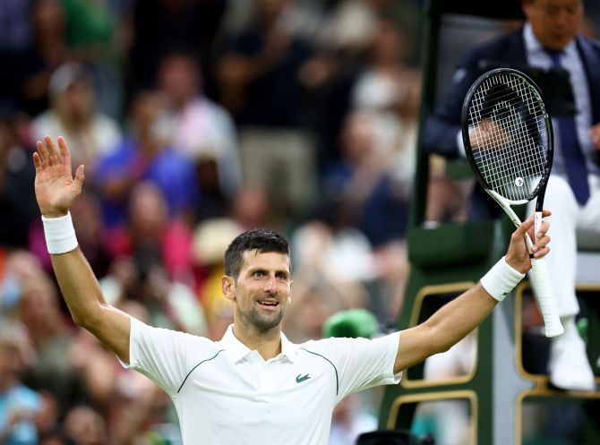 Serbia's Novak Djokovic celebrates winning his fourth round match against Netherlands' Tim van Rijthoven, at the All England Lawn Tennis and Croquet Club, London, on Sunday.  