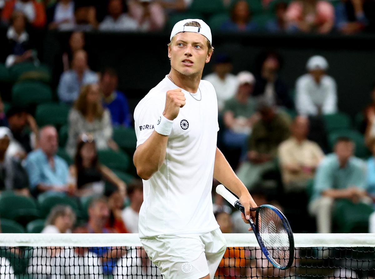 The Netherlands' Tim van Rijthoven reacts after winning a point during his fourth round match against Serbia's Novak Djokovic. 