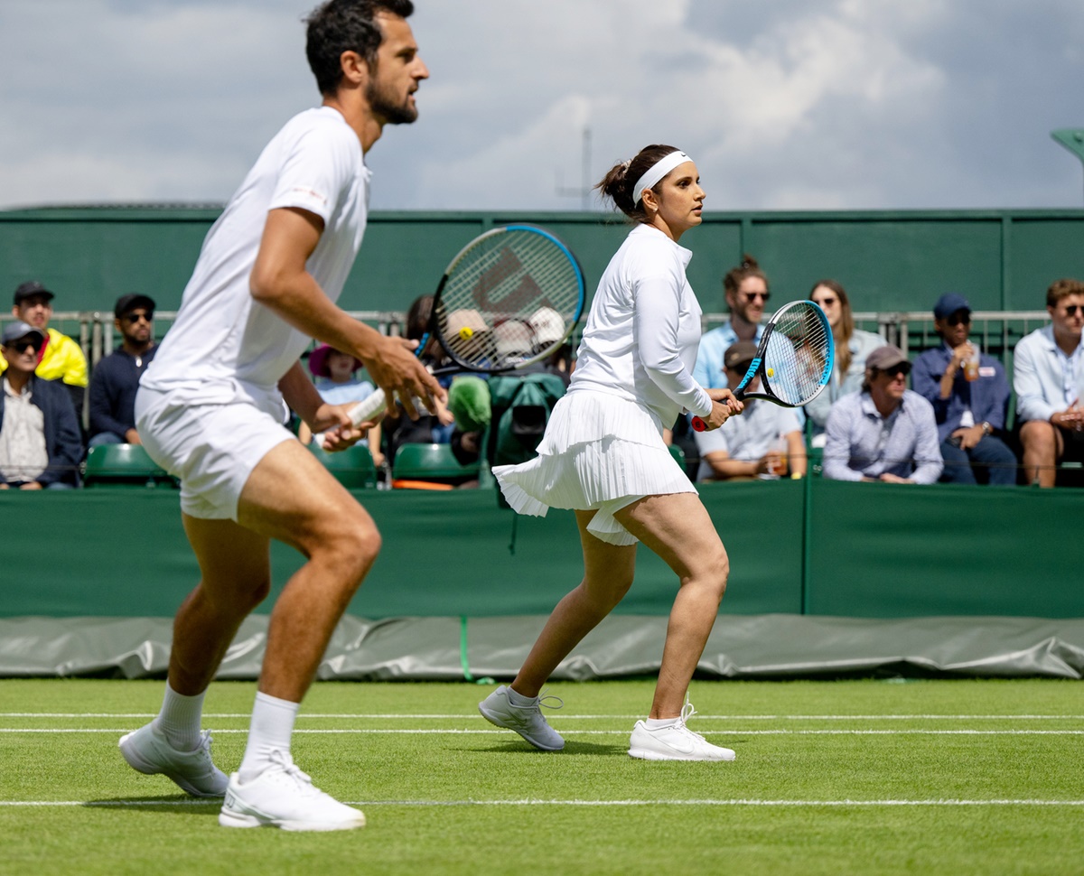 Wimbledon Sania Mirza makes mixed doubles semis Rediff Sports