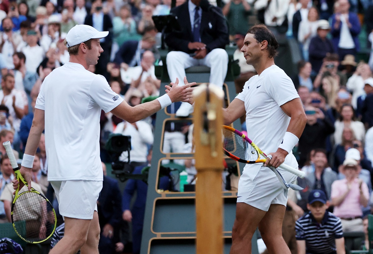 Rafael Nadal and Botic van de Zandschulp shake hands after the match.