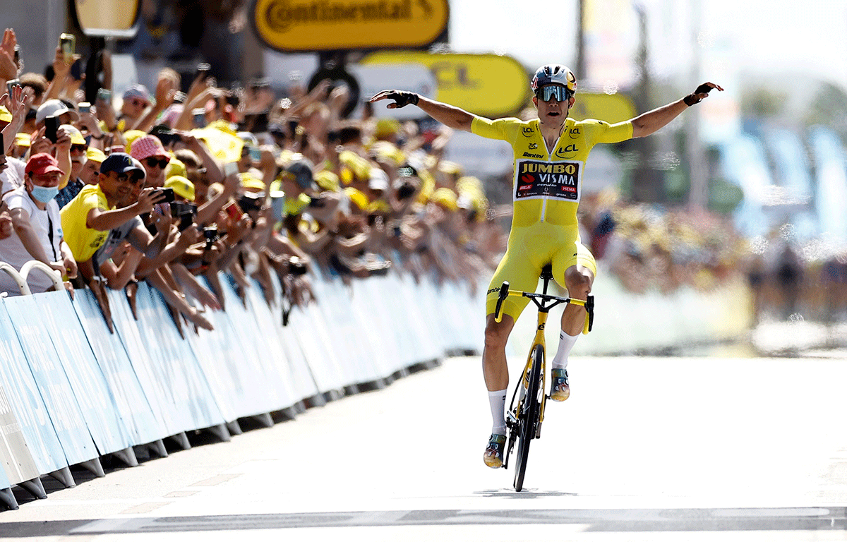 Jumbo - Visma's Wout Van Aert celebrates as he crosses the finish line to win stage 4, Dunkirk to Calais of the  Tour de France on Tuesday 