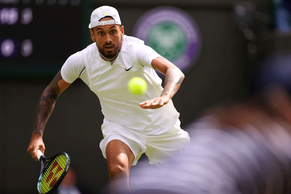 Nick Kyrgios runs to return a forehand against Cristian Garin