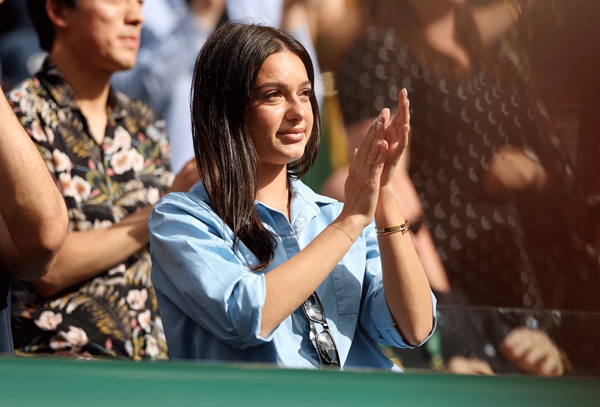 Australia's Nick Kyrgios's girlfriend Costeen Hatzi celebrates after his quarter-final win against Chile's Cristian Garin