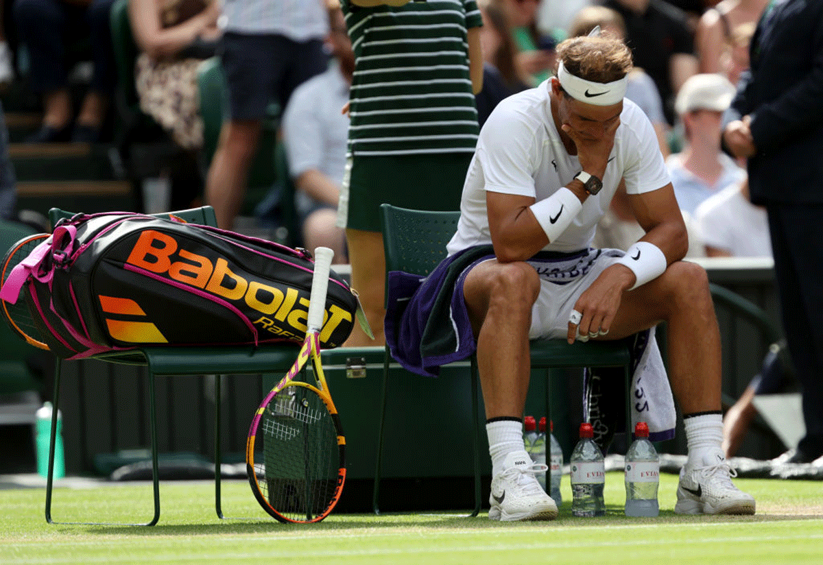 The 36-year-old Rafael Nadal, who won the Australian and French Open titles back-to-back this year for the first time in his career, left the court for a medical time-out for an abdominal issue with his father fervently urging him from the player's box to put an end to his misery.