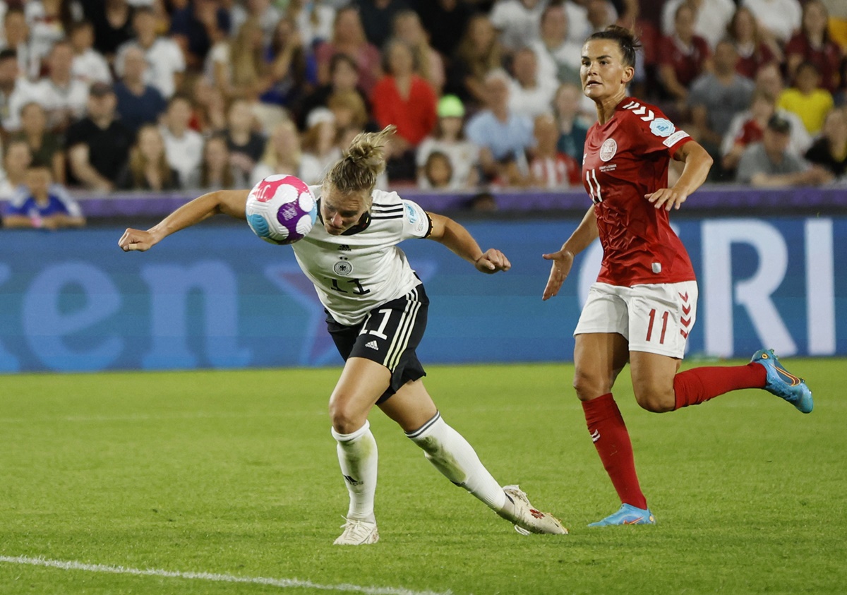 Alexandra Popp scores Germany's fourth goal in the Euro 2022  Group B match against Denmark, at Brentford Community Stadium, in London, on Friday.
