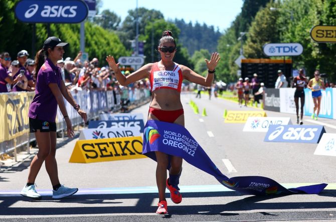Peru's Kimberly Garcia Leon crosses the finish line to win the women's 20 Kilometres race walk at the World Athletics Championships, in Eugene, Oregon, on Friday.