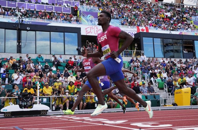 Fred Kerley crosses the line first in his men's 100 metres semi-final heat.