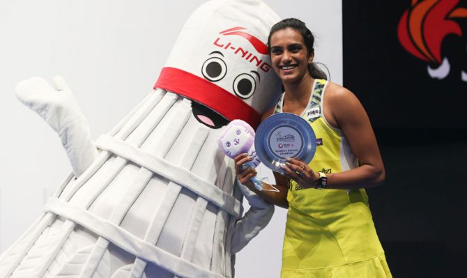 Pusarla Sindhu poses with the trophy after winning the Singapore Open 2022 on Sunday.