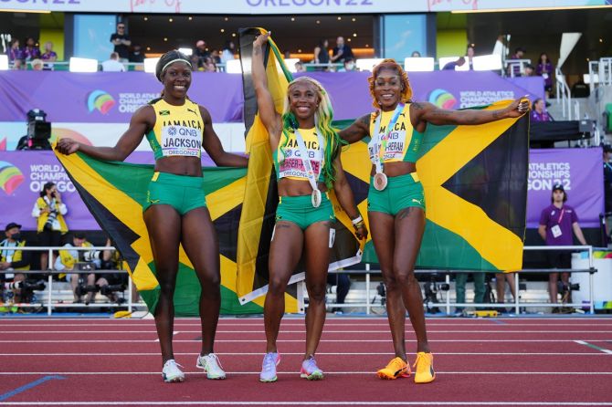 Jamaica's Shelly-Ann Fraser-Pryce celebrates winning the women's 100 metres final alongside teammates Shericka Jackson (silver) and Elaine Thompson-Herah (bronze) at the World Athletics Championships, at Hayward Field, Eugene, Oregon, on Sunday. 