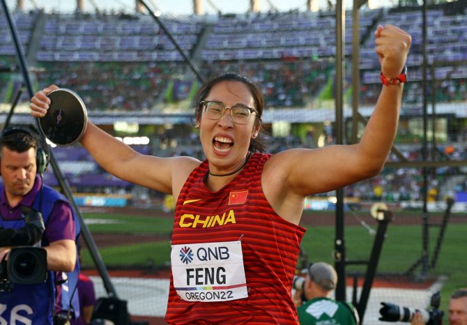 China's Feng Bin celebrates winning the women's discus throw gold at the World Athletics Championships in Eugene, Oregon, on Wednesday.