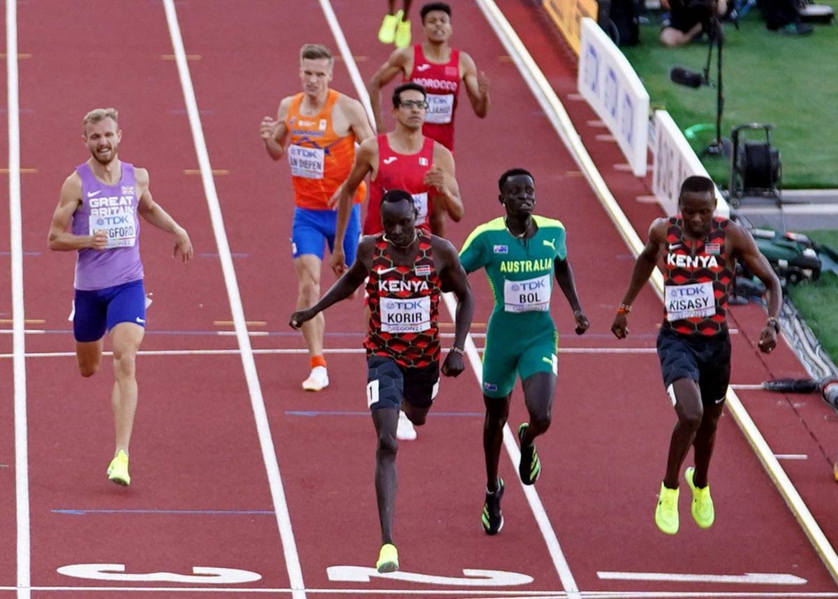 Kenya's Emmanuel Kipkurui Korir crosses the line to win his semi-final heat ahead of second-placed Kenya's Wyclife Kinyamal Kisasy, third-placed Australia's Peter Bol and fourth-placed Britain's Kyle Langford.